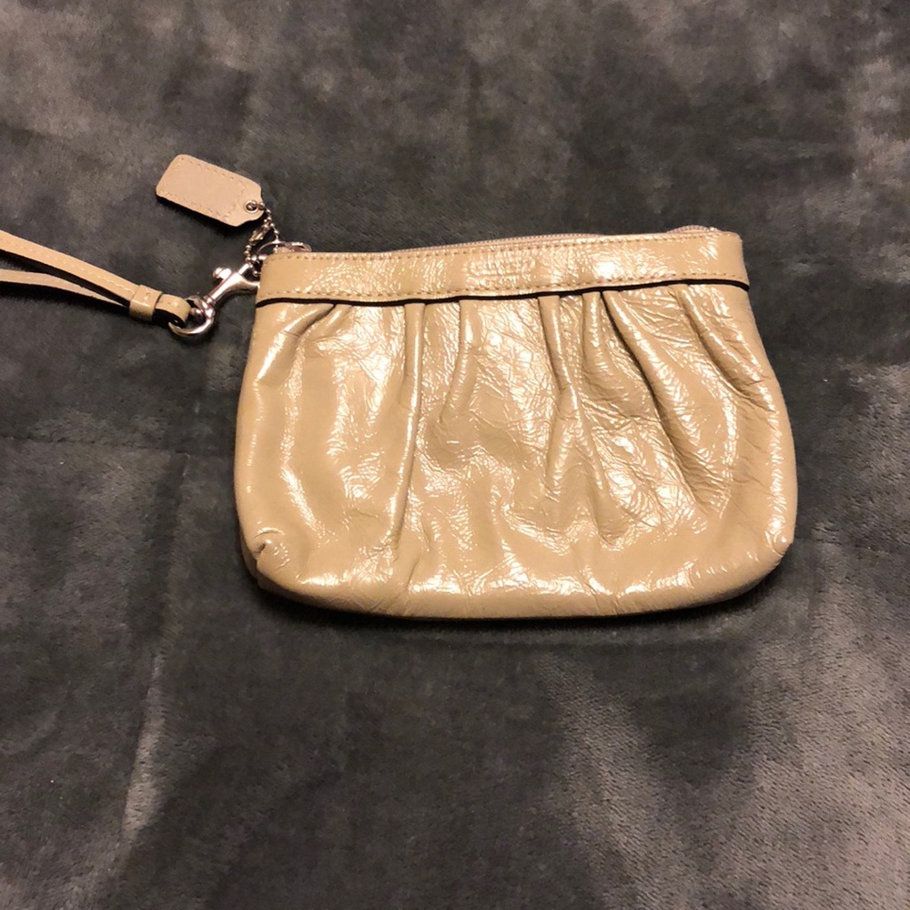 Beige coach wristlet